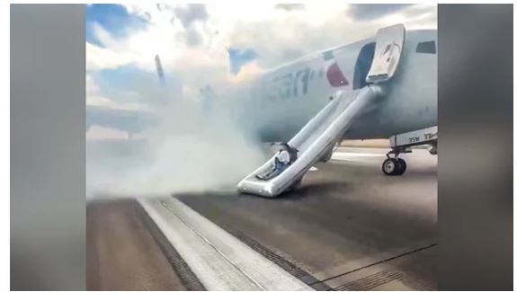 US: Passengers Evacuated After Plane's Landing Gear Catches Fire